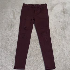 High waisted maroon jeans